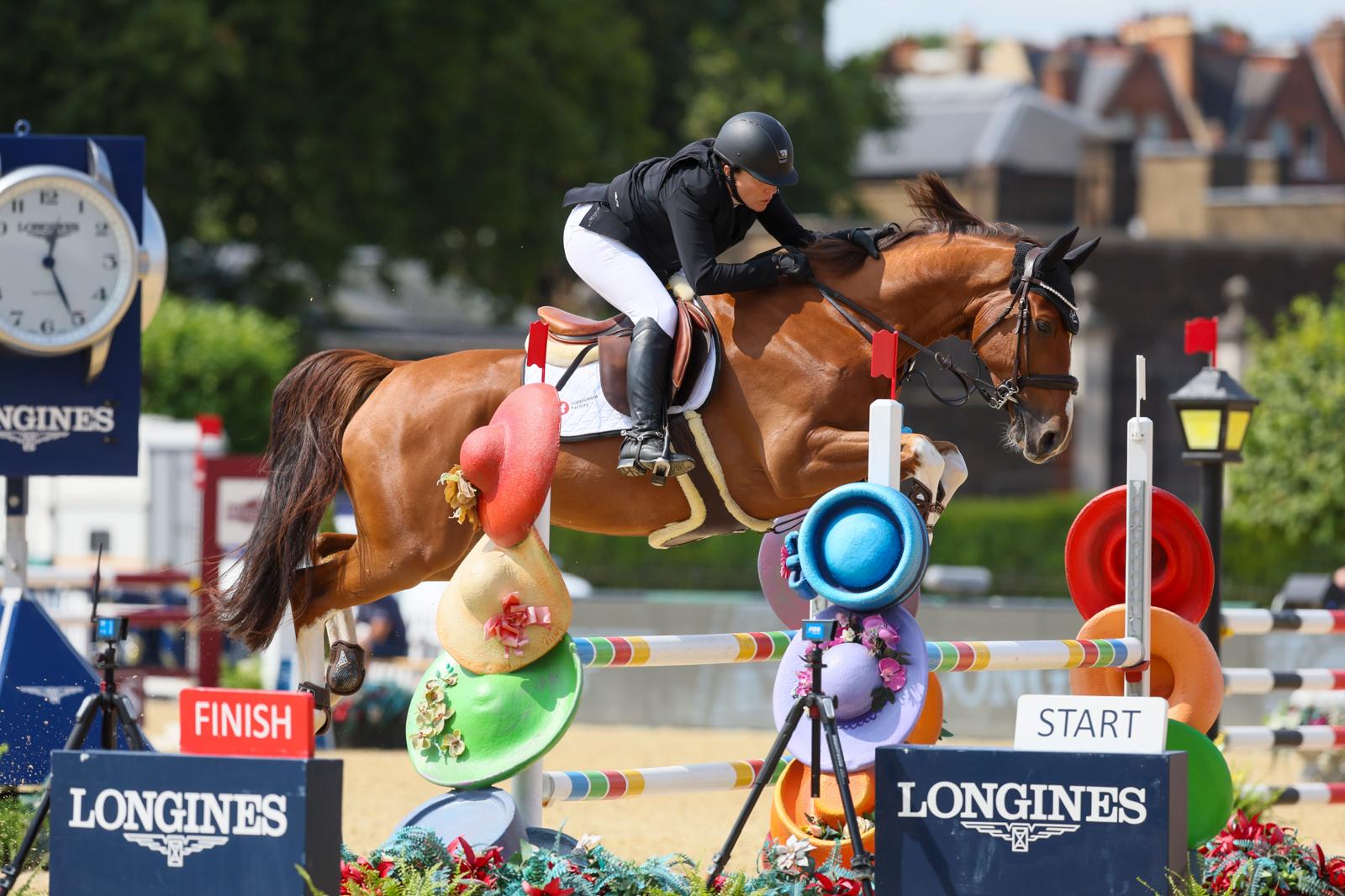 Sybil competing at LGCT London, wide jump shot